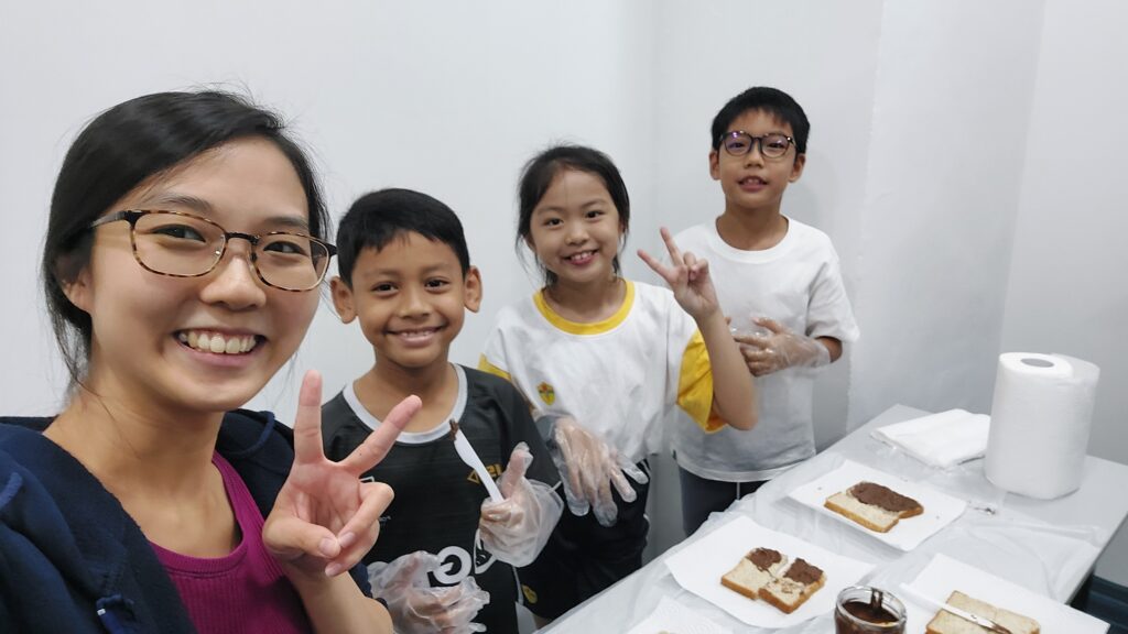 blue tree's math tutor with 3 primary school students