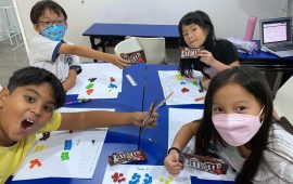 Five students having fun with M&Ms!